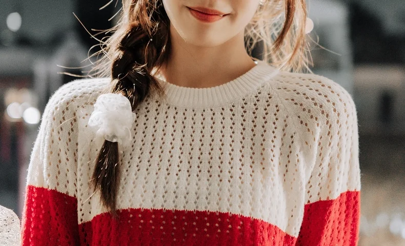 微笑む女性のくちもくちもと